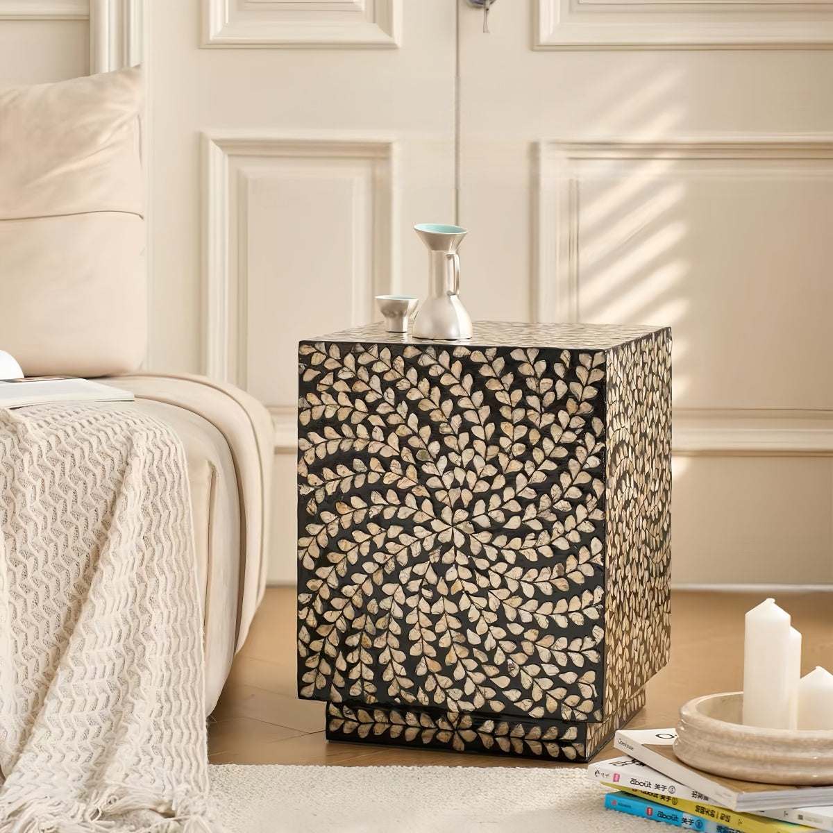 Luxury shell-inspired side table with handcrafted cylindrical design, durable natural materials, and versatile use for indoor and outdoor spaces