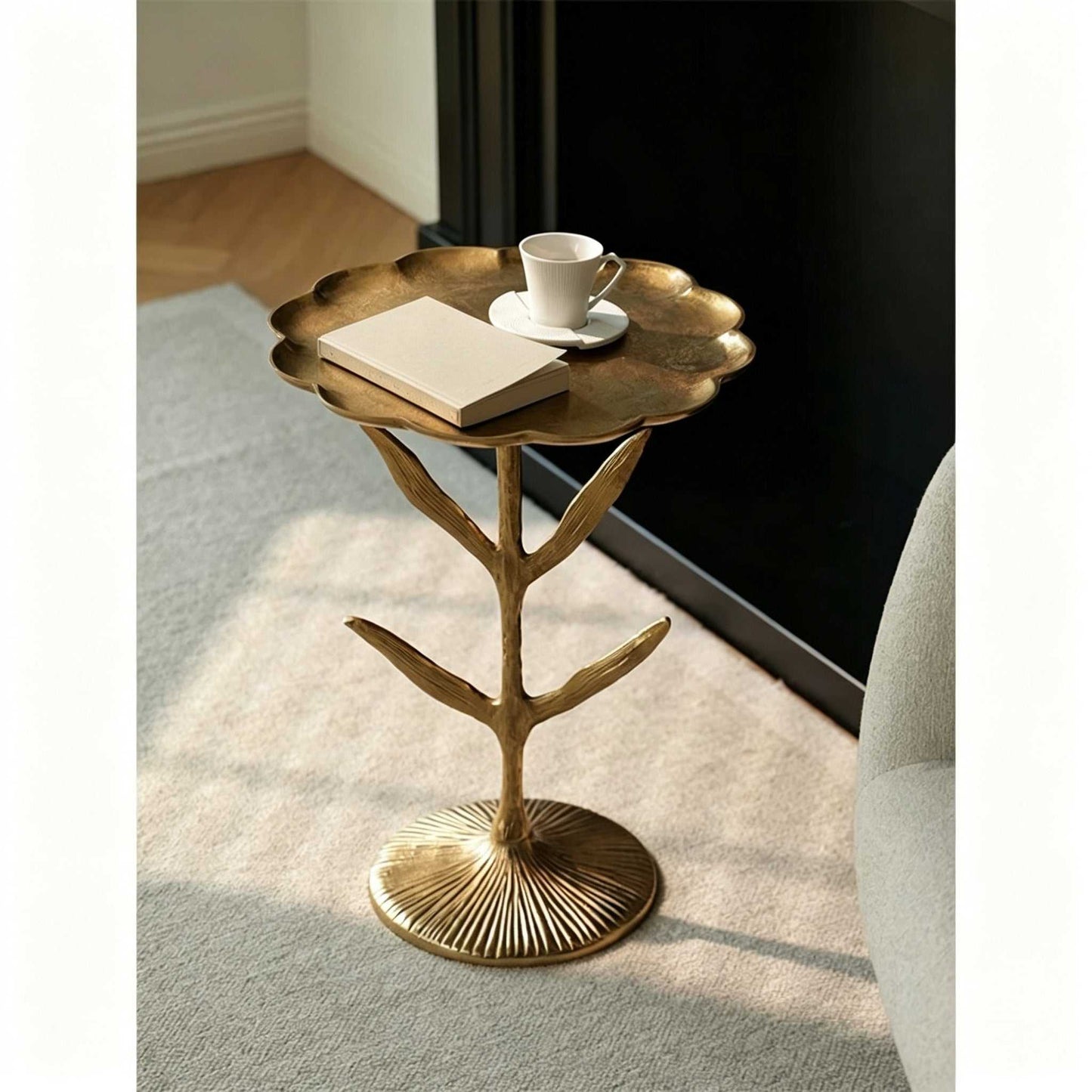 Luxury aluminum sofa side table with scalloped tabletop and sculptural leaf stem for modern living room and bedroom decor