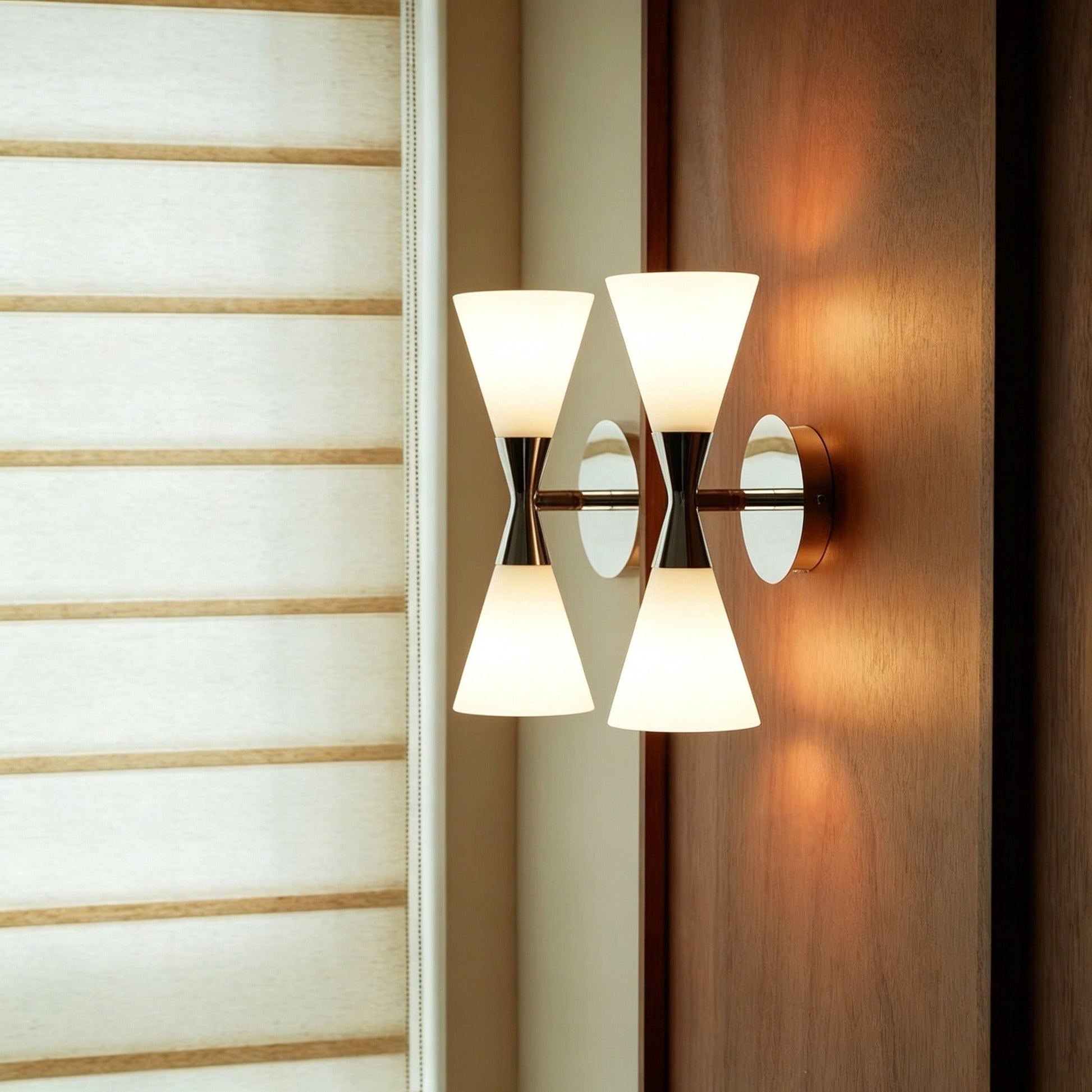 Nordic modern hourglass wall sconce with chrome-plated carbon steel and glass lampshade for living room lighting