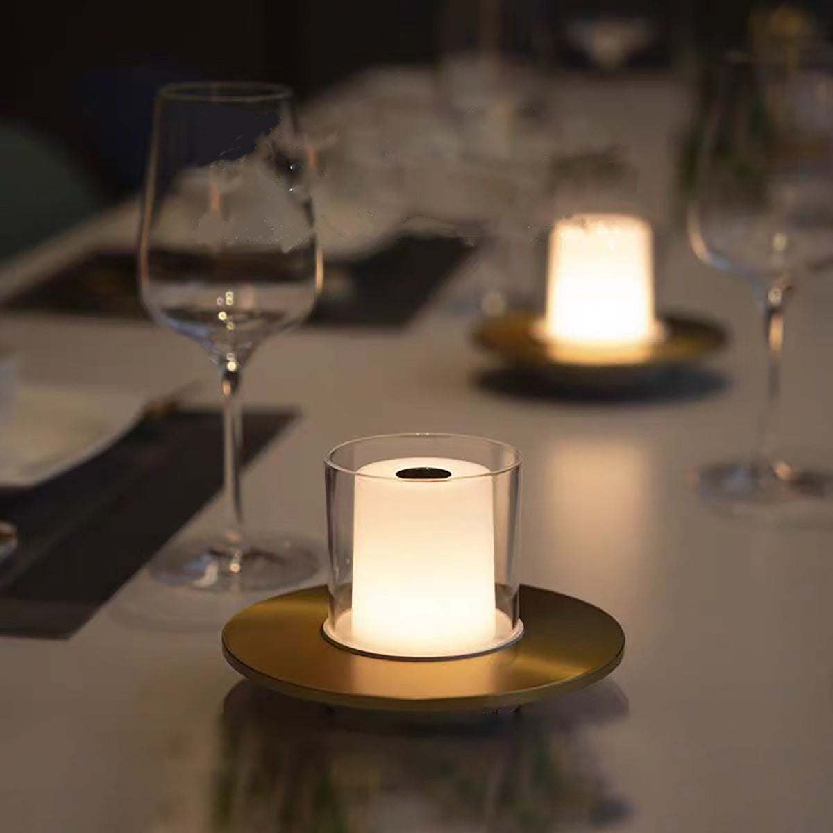Rechargeable ambience night lamp with warm LED glow on dining table in restaurant setting