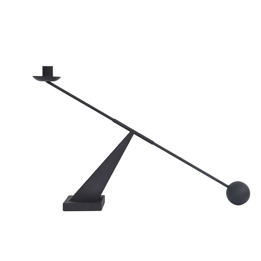Modern minimalist black candle holder with geometric wabi-sabi design, metal construction, and sleek balance style