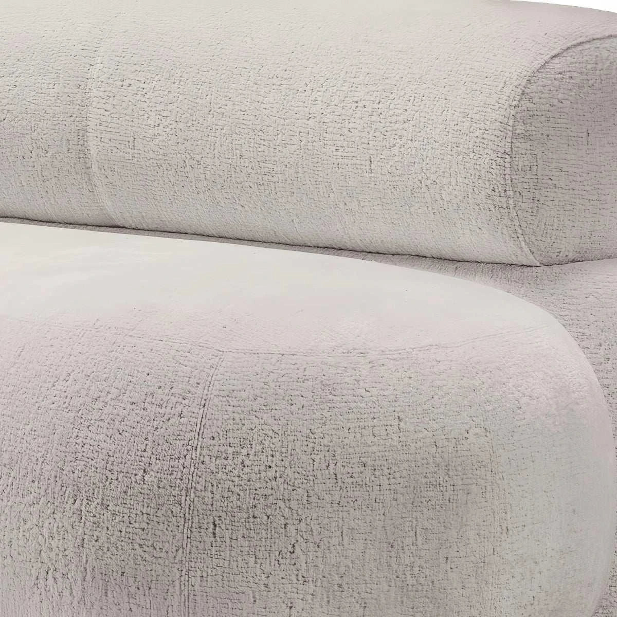 Eclipse Sofa with curved silhouette and textured boucle upholstery in modern organic design