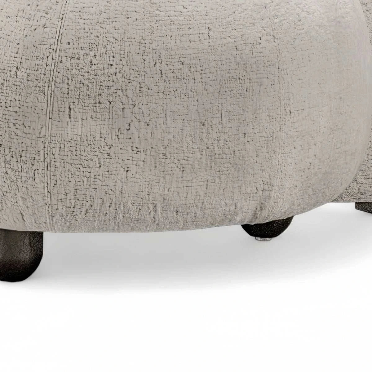 Eclipse sofa with curved silhouette and textured boucle upholstery in modern living room