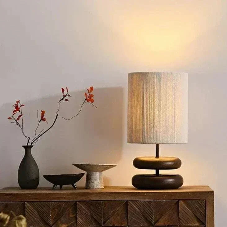 Japanese style wood table lamp with warm LED light on wooden sideboard