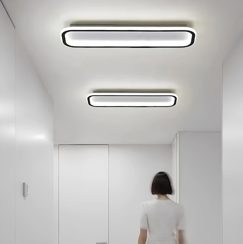 Modern LED ceiling lights illuminating a sleek living space - sparkledecor.com