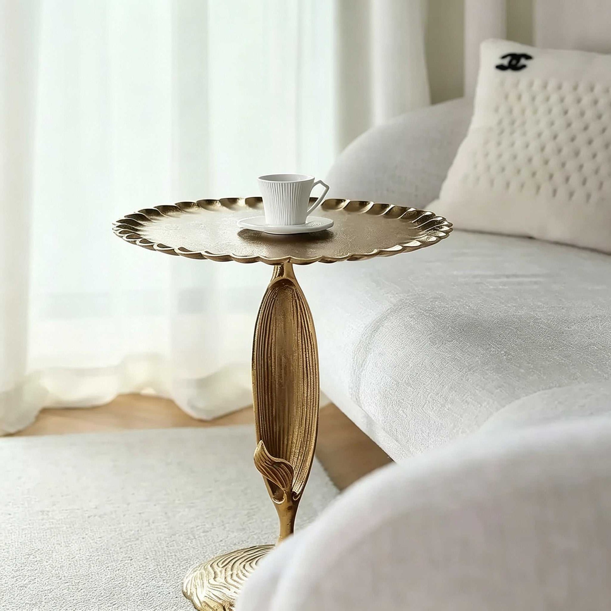 Luxury aluminum sofa side table with scalloped edge and sculptural leaf stem for bedroom and living room
