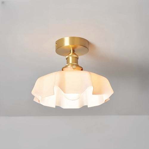 Elegant flush mount ceiling light with milky glass shade and polished copper fixture