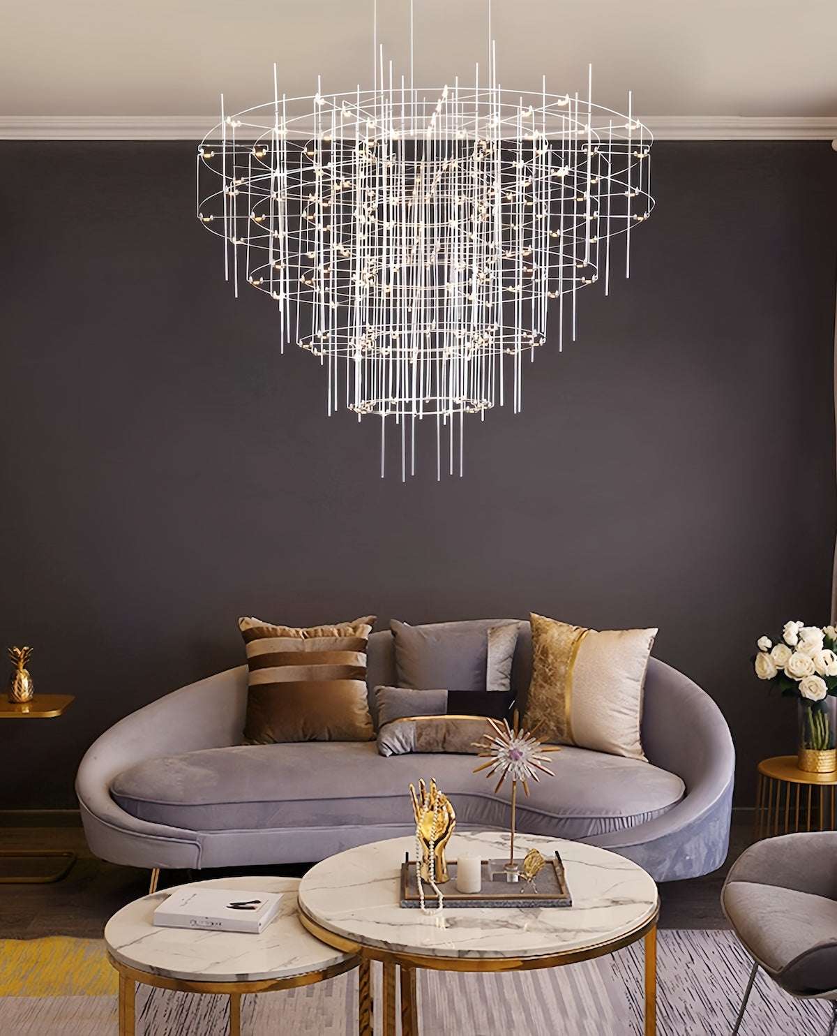 Modern Starry Sky Pendant Lamp chandelier with stainless steel design hanging over living room sofa