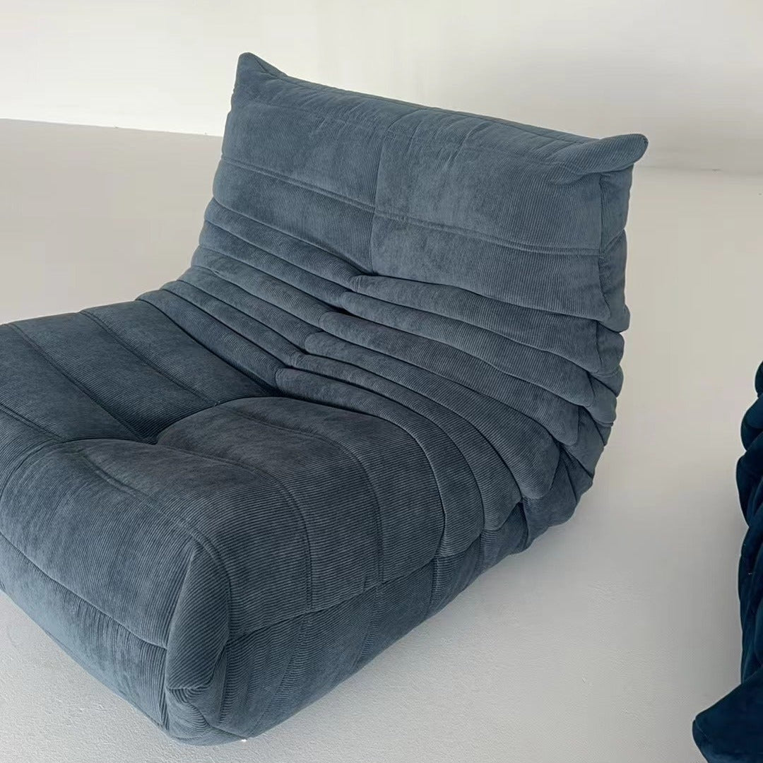 Corduroy Elegance: Cozy Togo Chair for Your Stylish Sanctuary