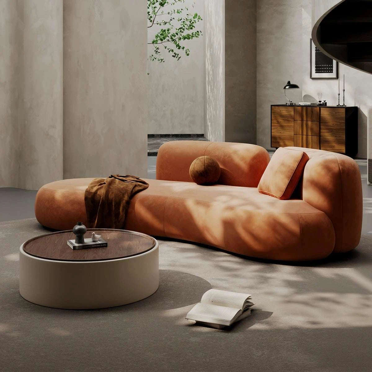 Cream curved sofa with retro light luxury design and stain-resistant upholstery for salon and boutique reception areas