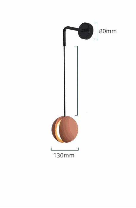 Concrete Moon Ceiling Light pendant with fish-shaped design and textured stone finish illuminating warm white ambient light