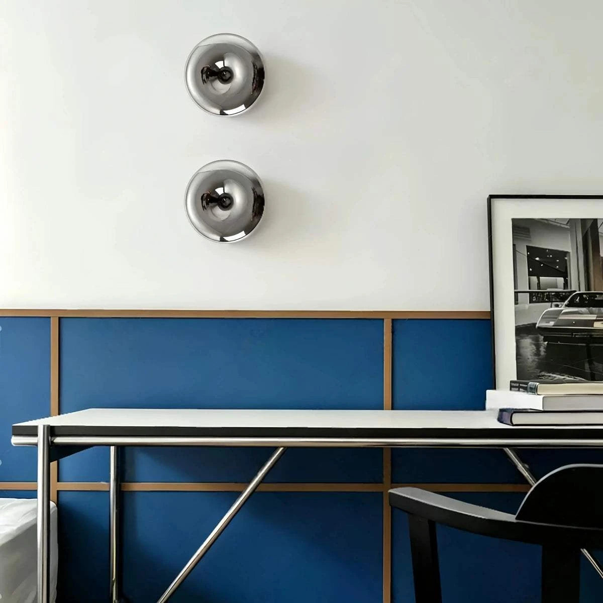 Bauhaus Glass Wall Sconce with hand-blown gradient glass and LED projection creating circular light patterns on wall