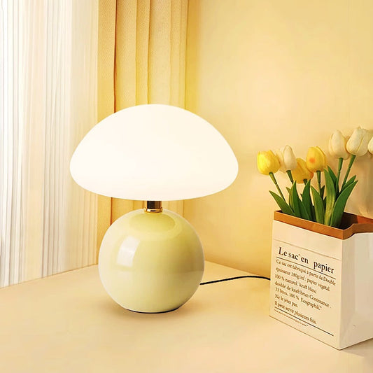 Ceramic table lamp with LED light on a cozy bedside table - sparkledecor.com