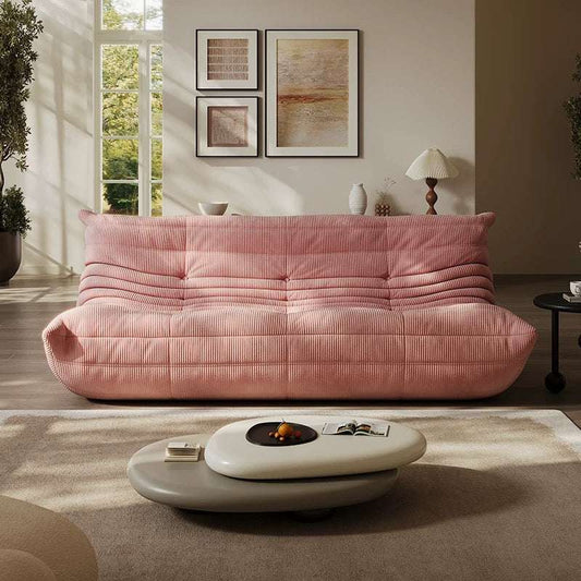 Pink Corduroy Bliss 3-seater Togo sofa in soft pink corduroy fabric in modern living room setting