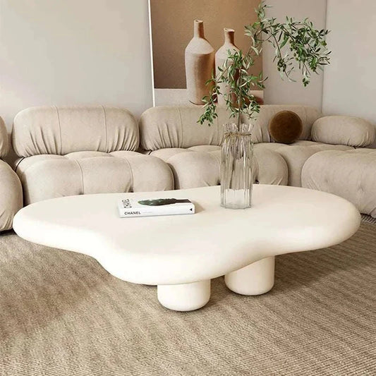 Modern Nordic white coffee table with cloud-inspired design in stylish living room