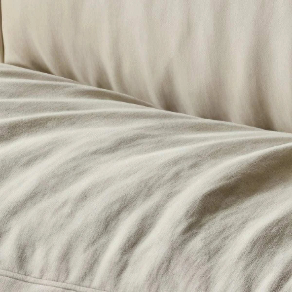 Minimalist armless linen sofa with natural wrinkles and washable cover for small spaces