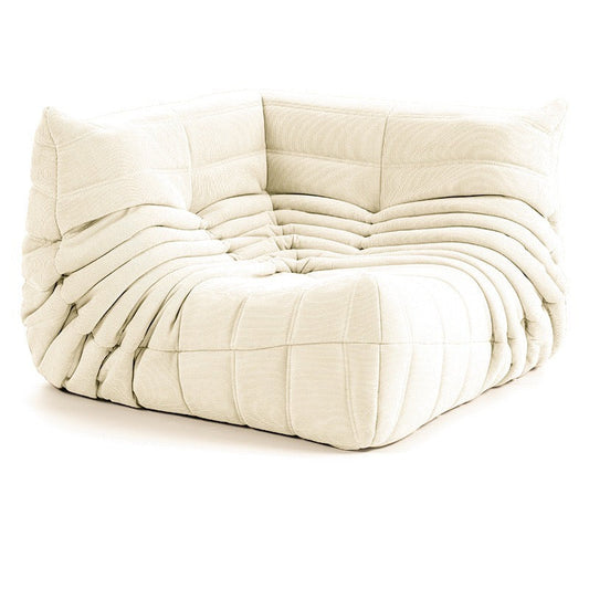 Luxurious Suede Togo Corner Sofa in beige, offering stylish comfort for modern living rooms - sparkledecor.com