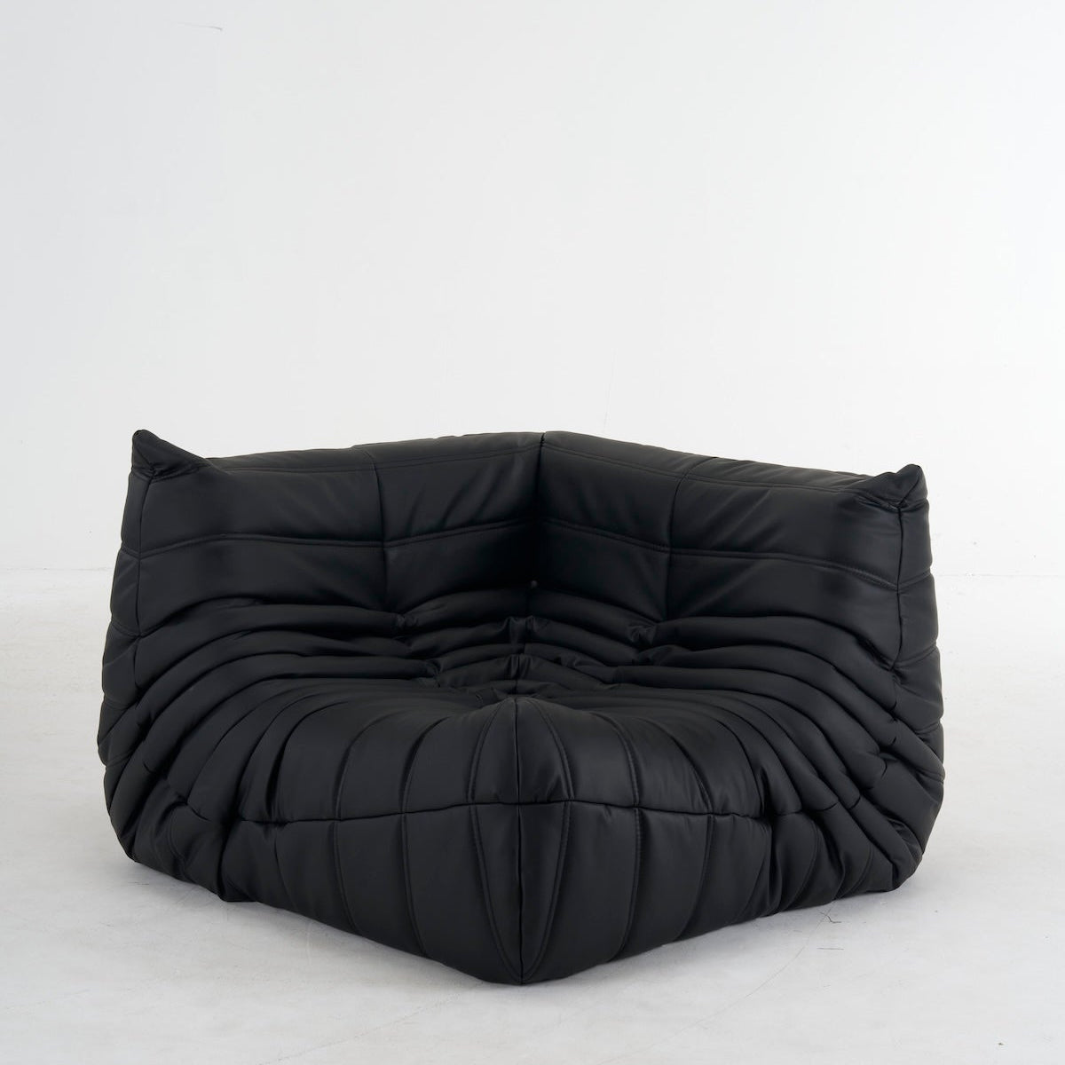 Black customizable leather Caterpillar corner sofa with ergonomic design and plush cushions