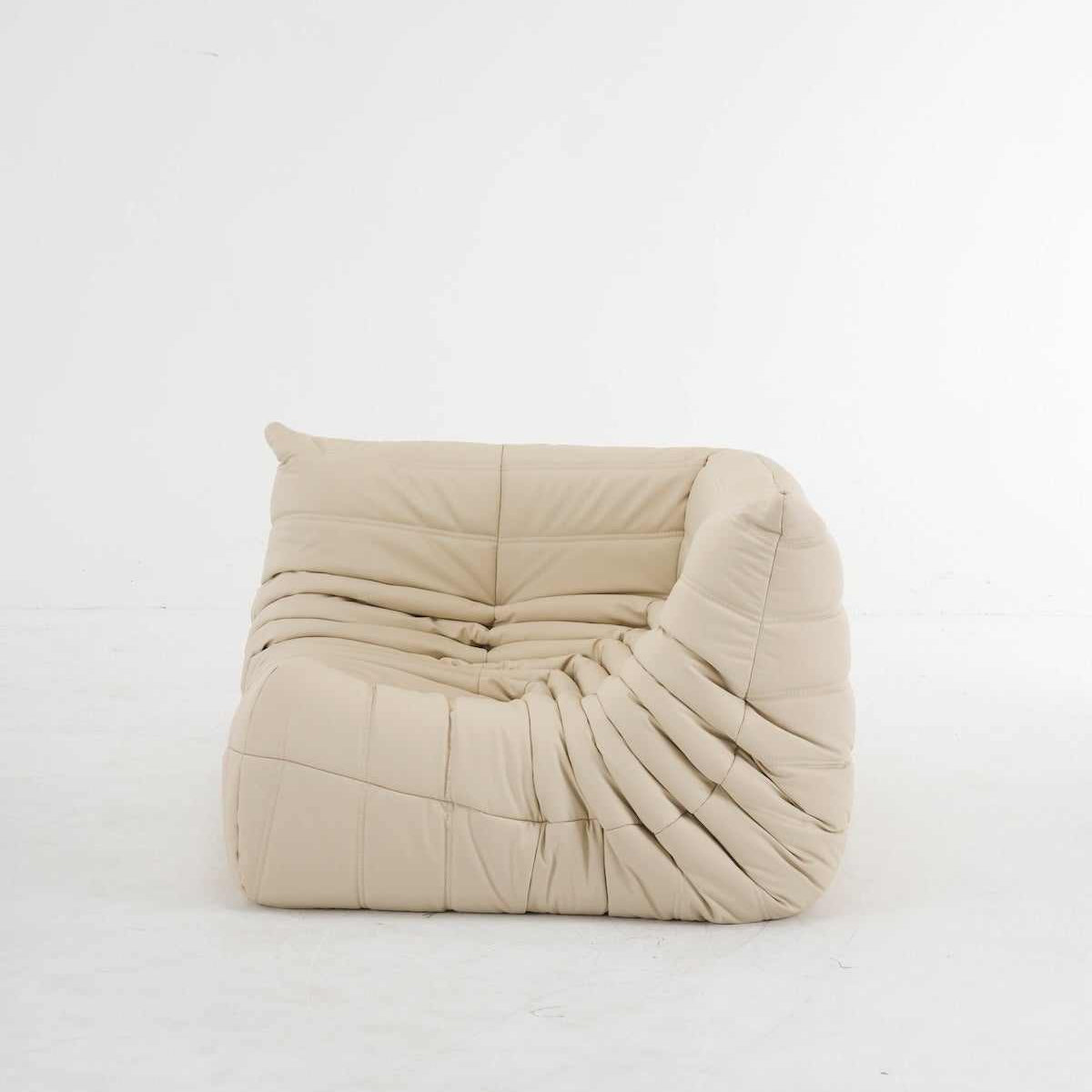 Beige customizable leather Caterpillar corner sofa with ergonomic design and plush cushions