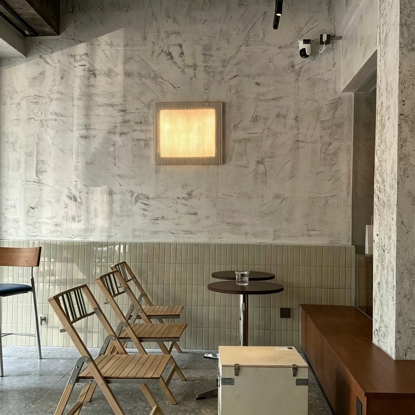 Nordic modern minimalist wall sconce with warm LED light and stainless steel mesh shade