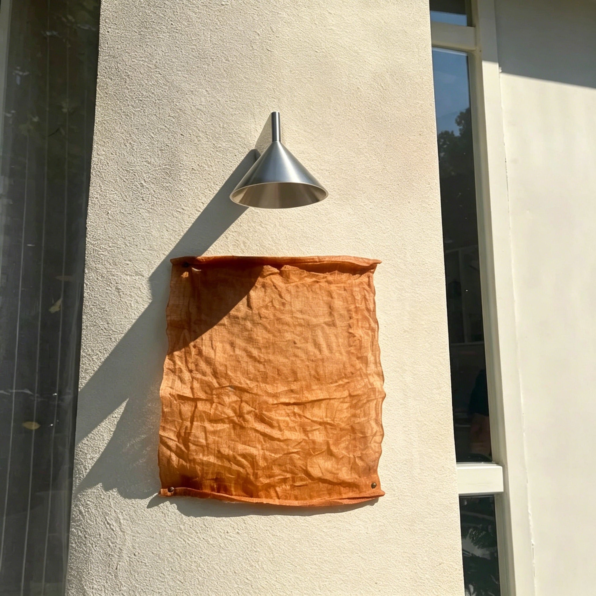 Italian minimalist modern wall sconce with conical aluminum shade and warm OSRAM COB LED light