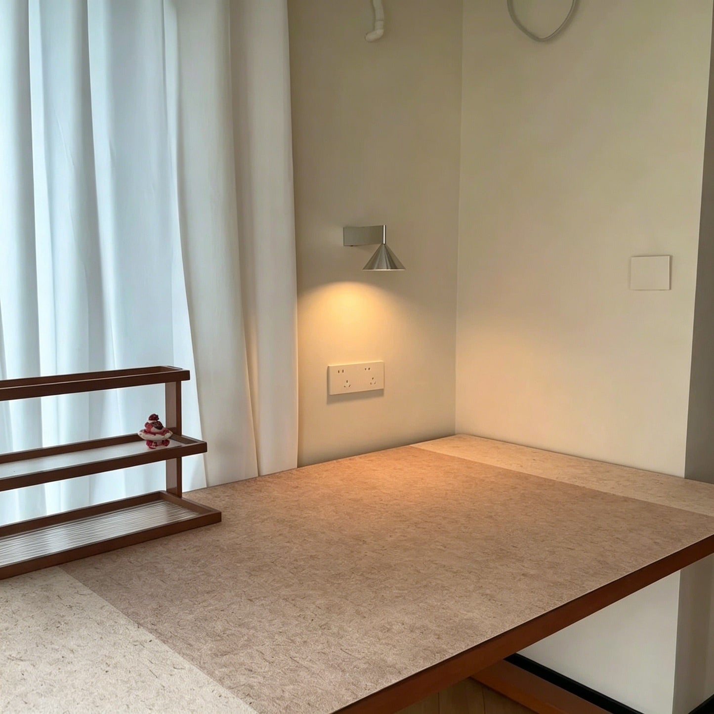 Italian minimalist modern wall sconce with conical aluminum shade and warm 3000K LED light