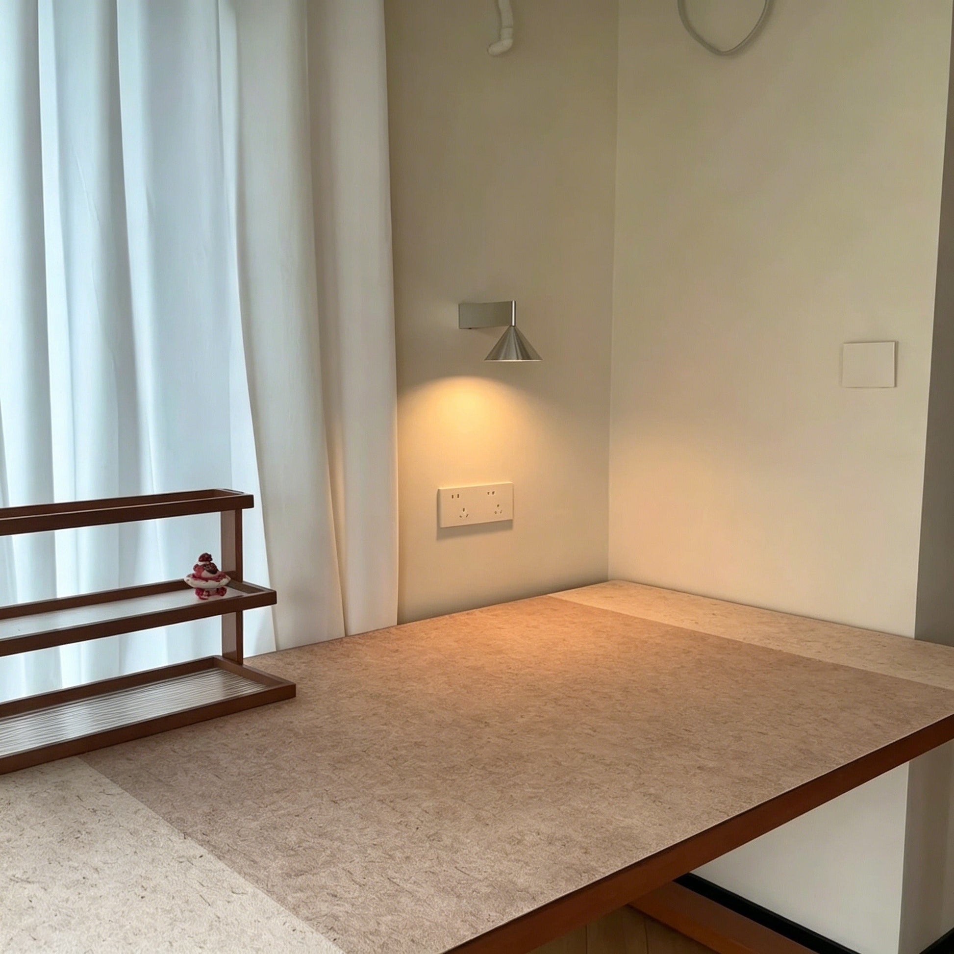 Italian minimalist modern wall sconce with conical aluminum shade and warm 3000K LED light