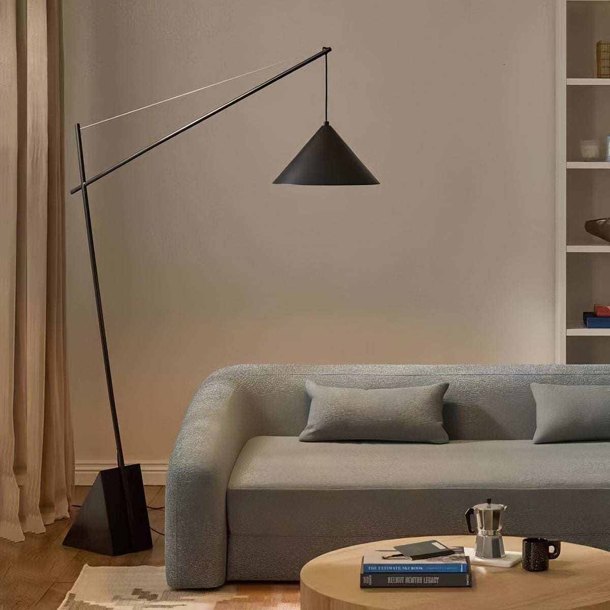 Minimalist floor lamp with sculptural design providing soft ambient light for modern living rooms and bedrooms