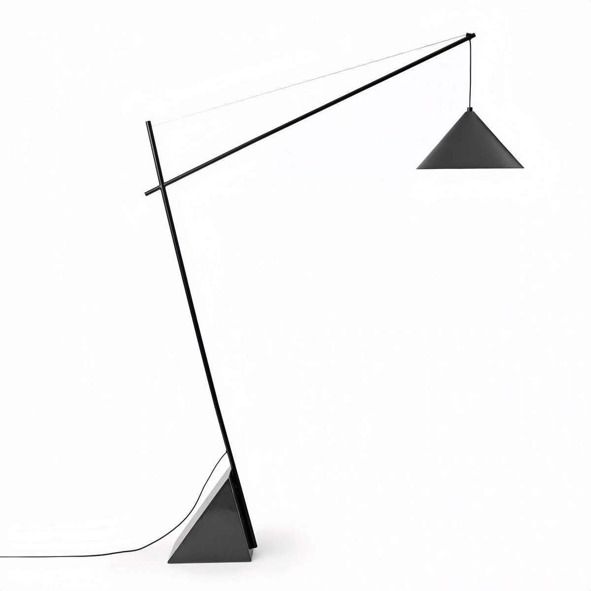 Minimalist floor lamp with sculptural design providing soft ambient light for modern living rooms and bedrooms