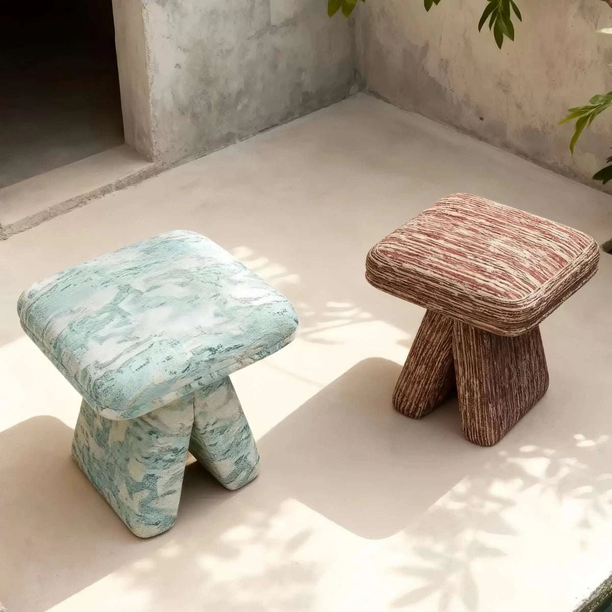 Nordic designer accent stool with textured fabric and three-leg base for living room and bedroom use