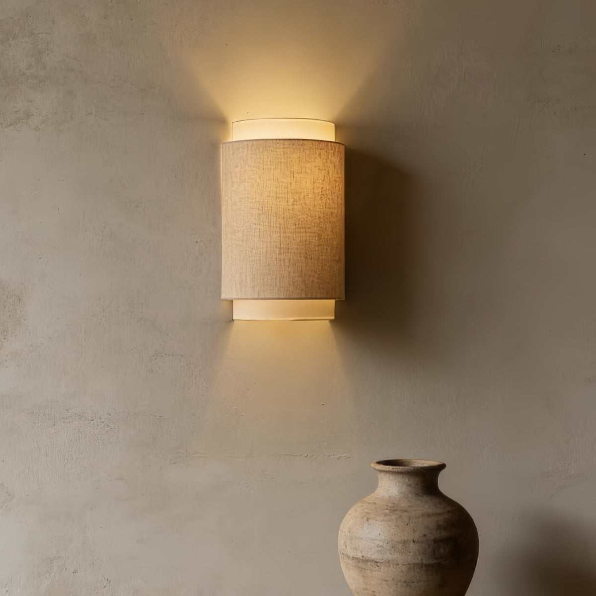 Minimalist Wabi-Sabi wall lamp with linen fabric shade and warm ambient light for Nordic modern interiors