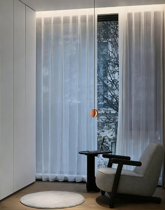 Concrete moon pendant light with fish-shaped design and textured stone finish for ambient industrial lighting