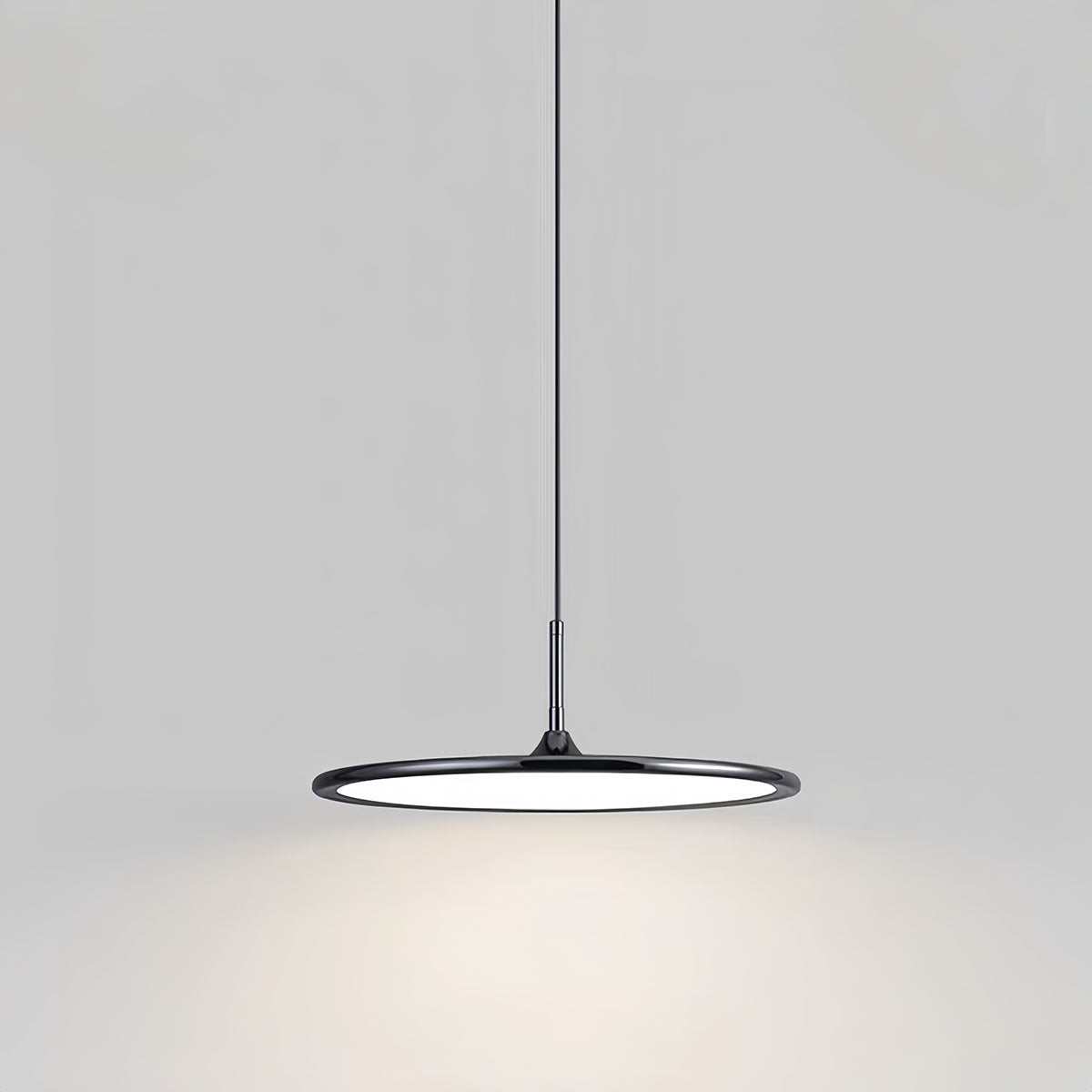 Minimalist dining pendant light with sleek black metal frame and LED illumination for modern interiors