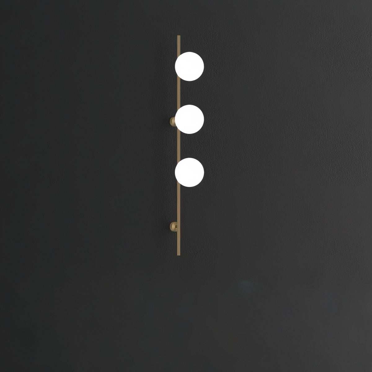 Minimalist brass wall sconce with cream-style glass shade and solid brass ceiling plate for bedside lighting