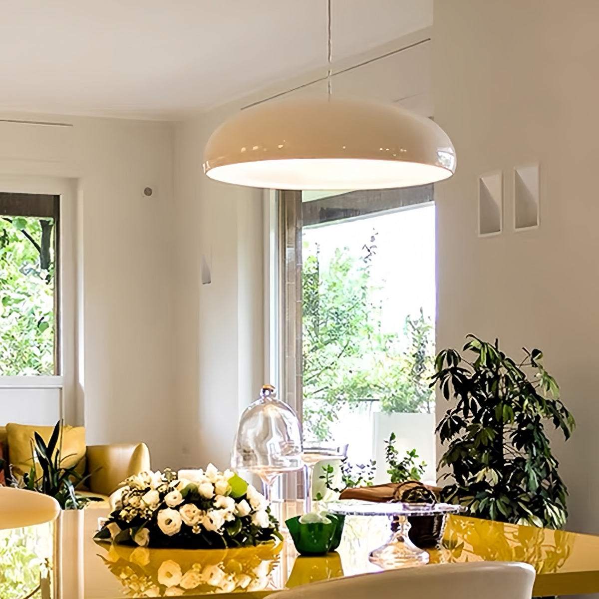 modern minimalist red pendant light hanging in stylish living room interior