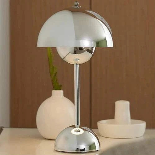 Scandi Table Lamp with mushroom-shaped silver metallic shade and slim stand on a desk with neutral decor.