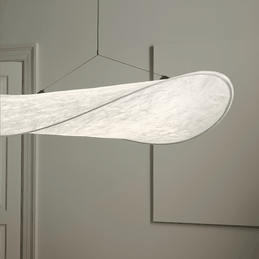 Modern living room pendant light with elegant Dupont paper shade and soft warm glow
