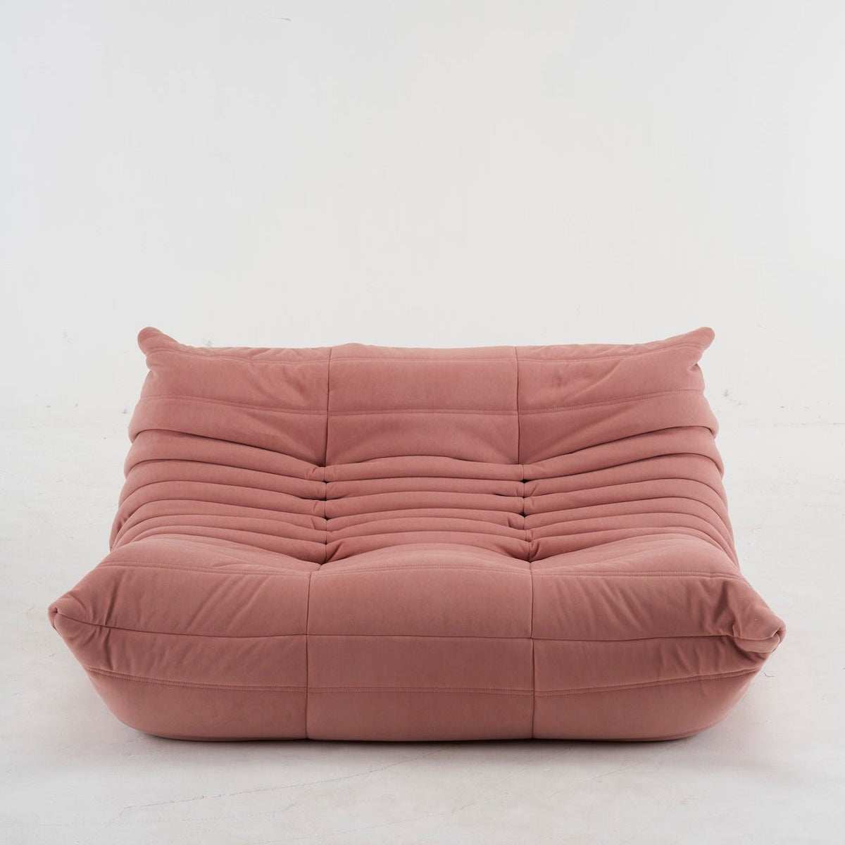 modern suede loveseat sofa in dusty rose with ergonomic cushioned design