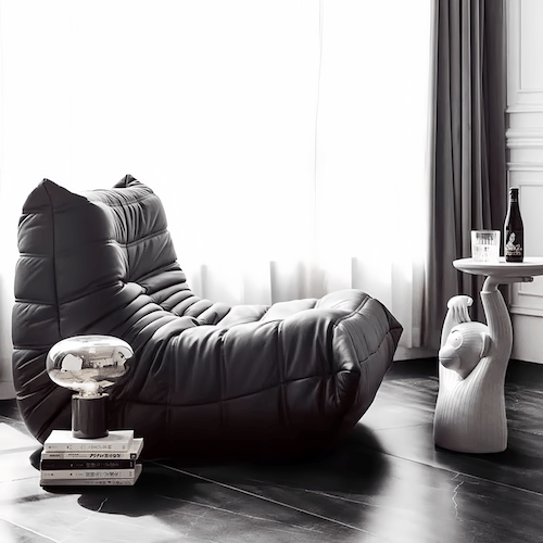 Black Togo Chair lounge with plush high-rebound foam in modern living room setting