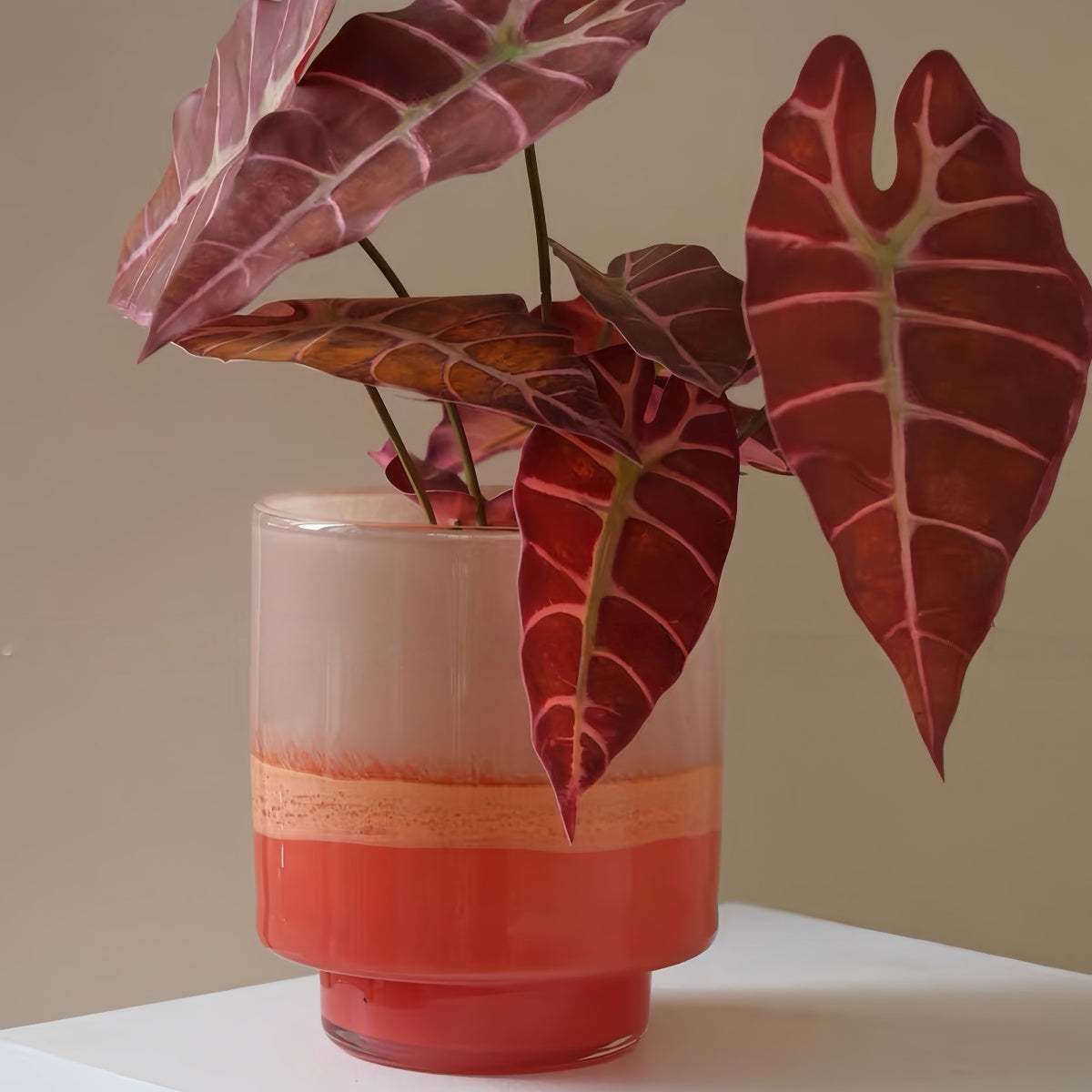 Gradient Nordic Vintage hand-blown glass vase with orange-pink hues and unique handcrafted color variations