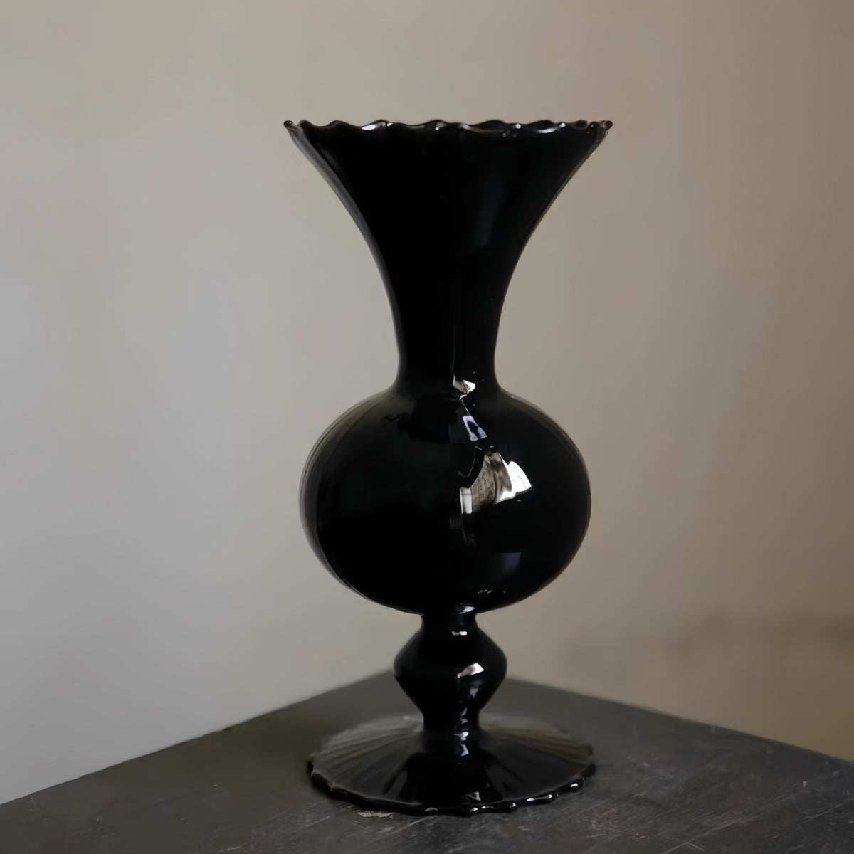Vintage black glass vase with minimalist silhouette and dark smoked finish for living room decor