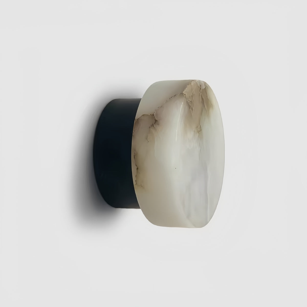 Natural Onyx Wall Lamp with minimalist round design and warm cream glow