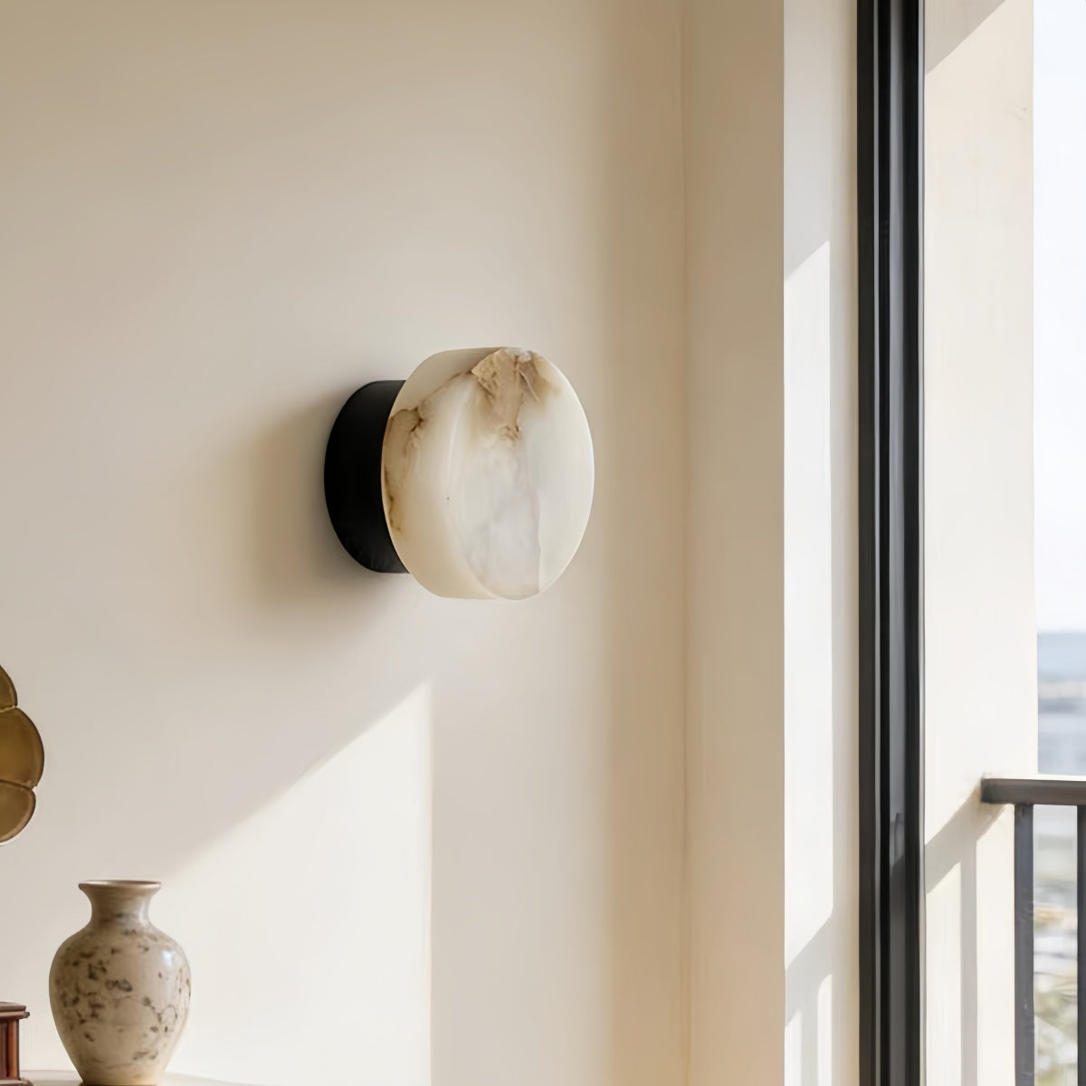 Natural Onyx Wall Lamp with minimalist round vintage design and warm cream glow