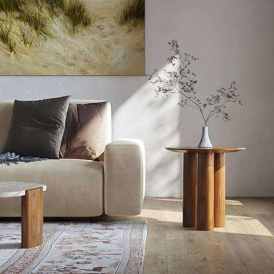 Elegant pino wood side table with rounded edges in modern living room setting