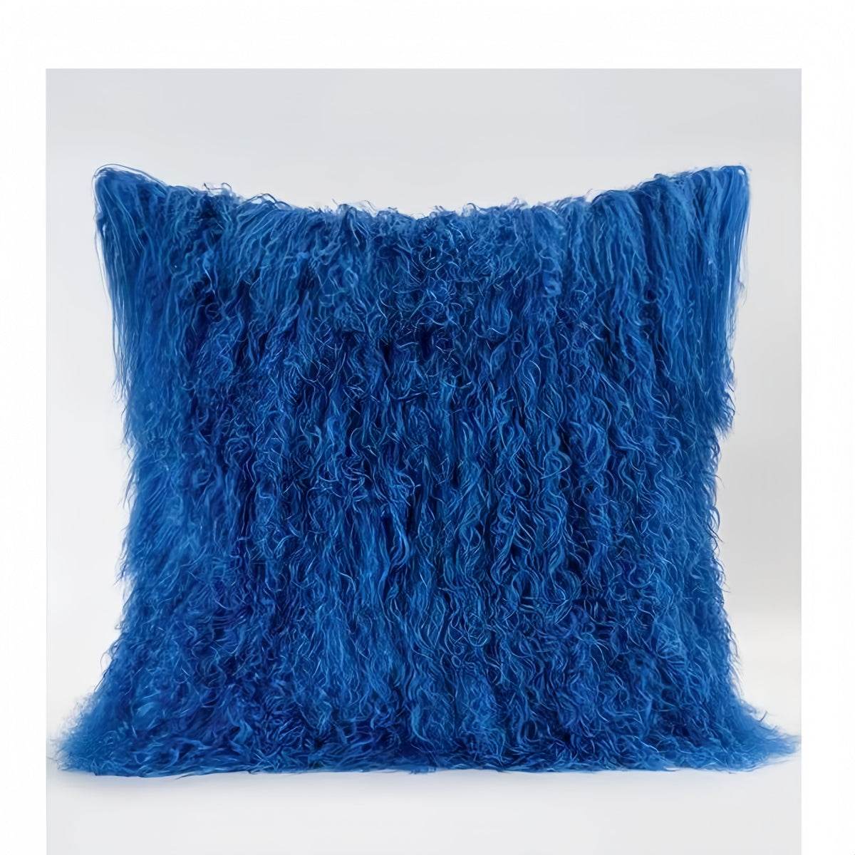 Modern minimalist burgundy lamb wool throw pillow with plush texture on sofa