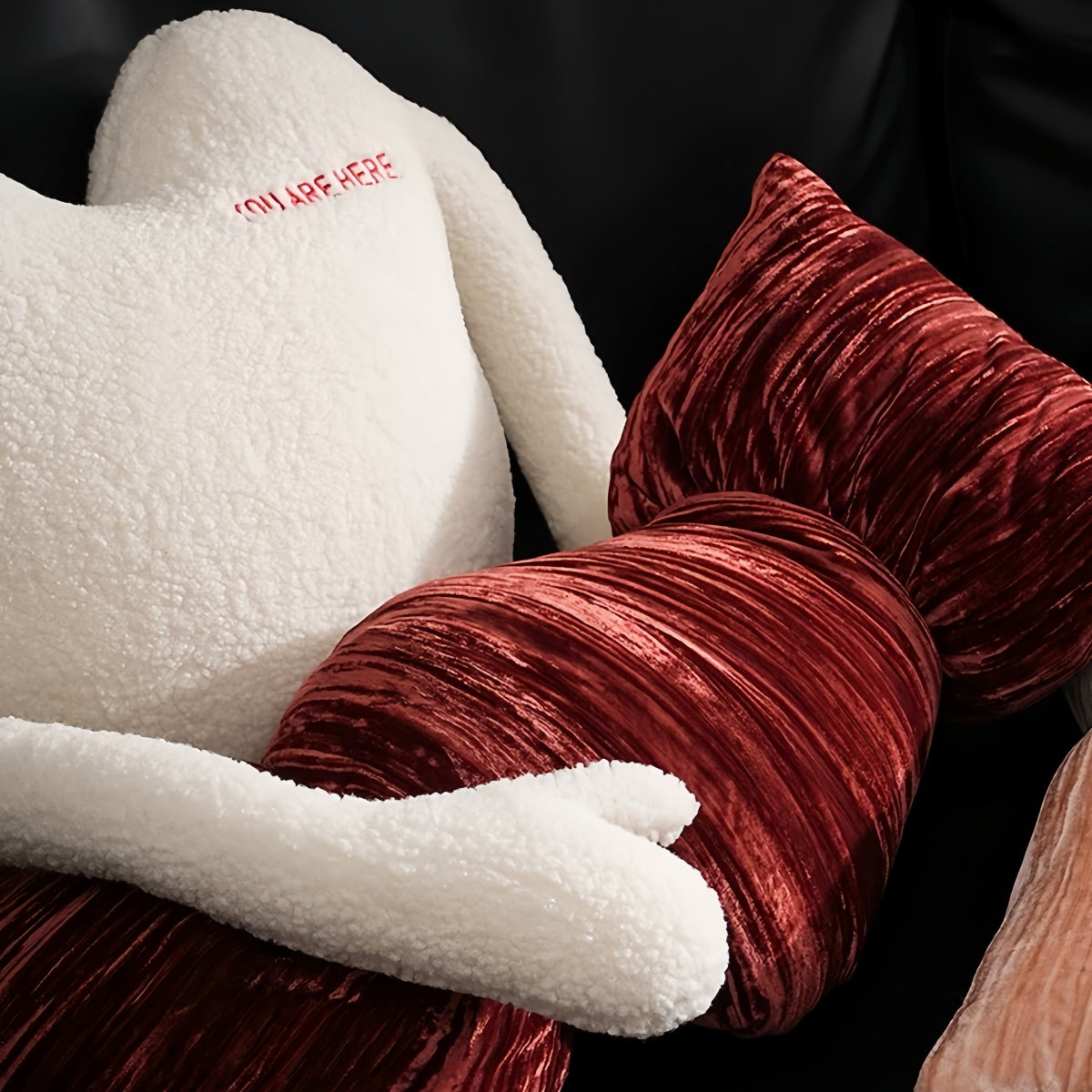 Luxury velvet decorative candy pillow in rich brown color with soft plush texture