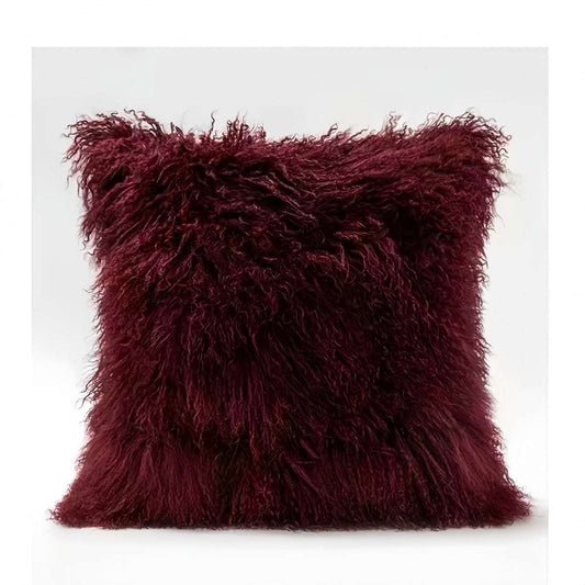 Modern minimalist burgundy lamb wool throw pillow with plush texture and square shape
